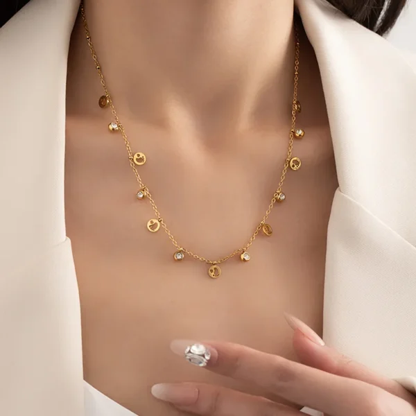 GlinTrail minimal anti tarnish footprint charm and  Stone Necklace